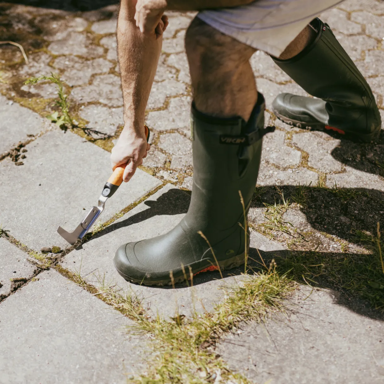 Kiveystenpuhdistusrauta Fiskars Xact