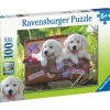Palapeli Ravensburger Traveling Pups 100 palaa